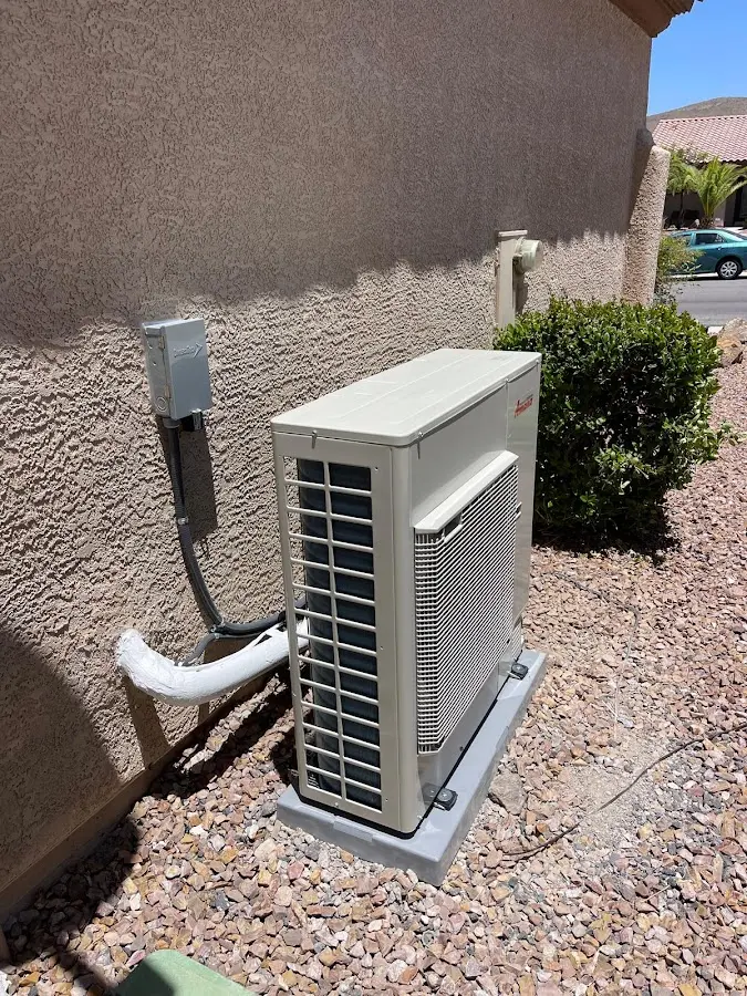 Residential air conditioning condenser unit in Edwards